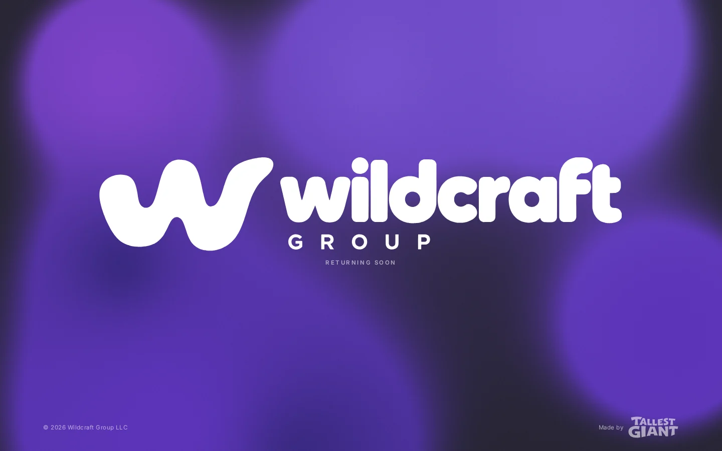 The holding page: the Wildcraft Group wordmark on a moving ultraviolet field, with the line Returning soon